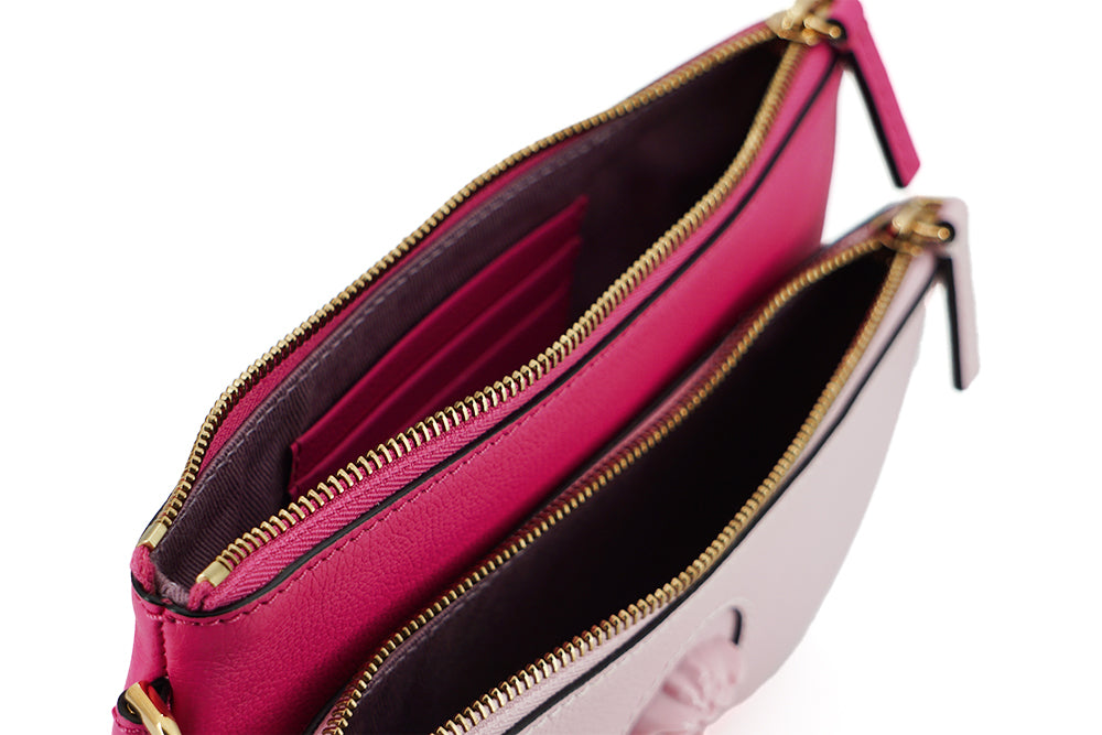 Versace Elegante Clutch aus rosa Leder