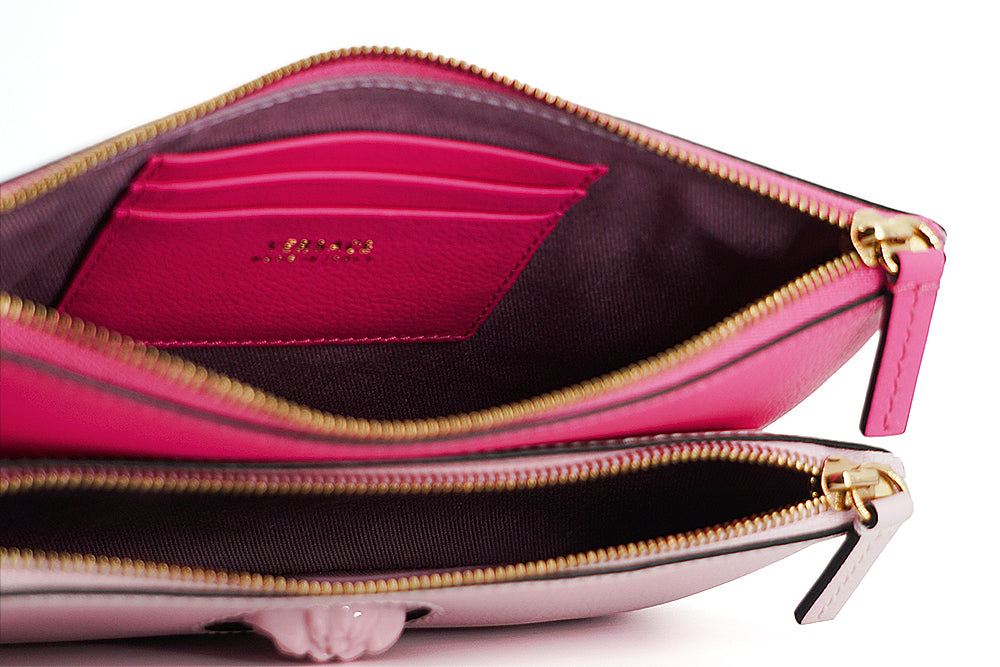 Versace Elegante Clutch aus rosa Leder