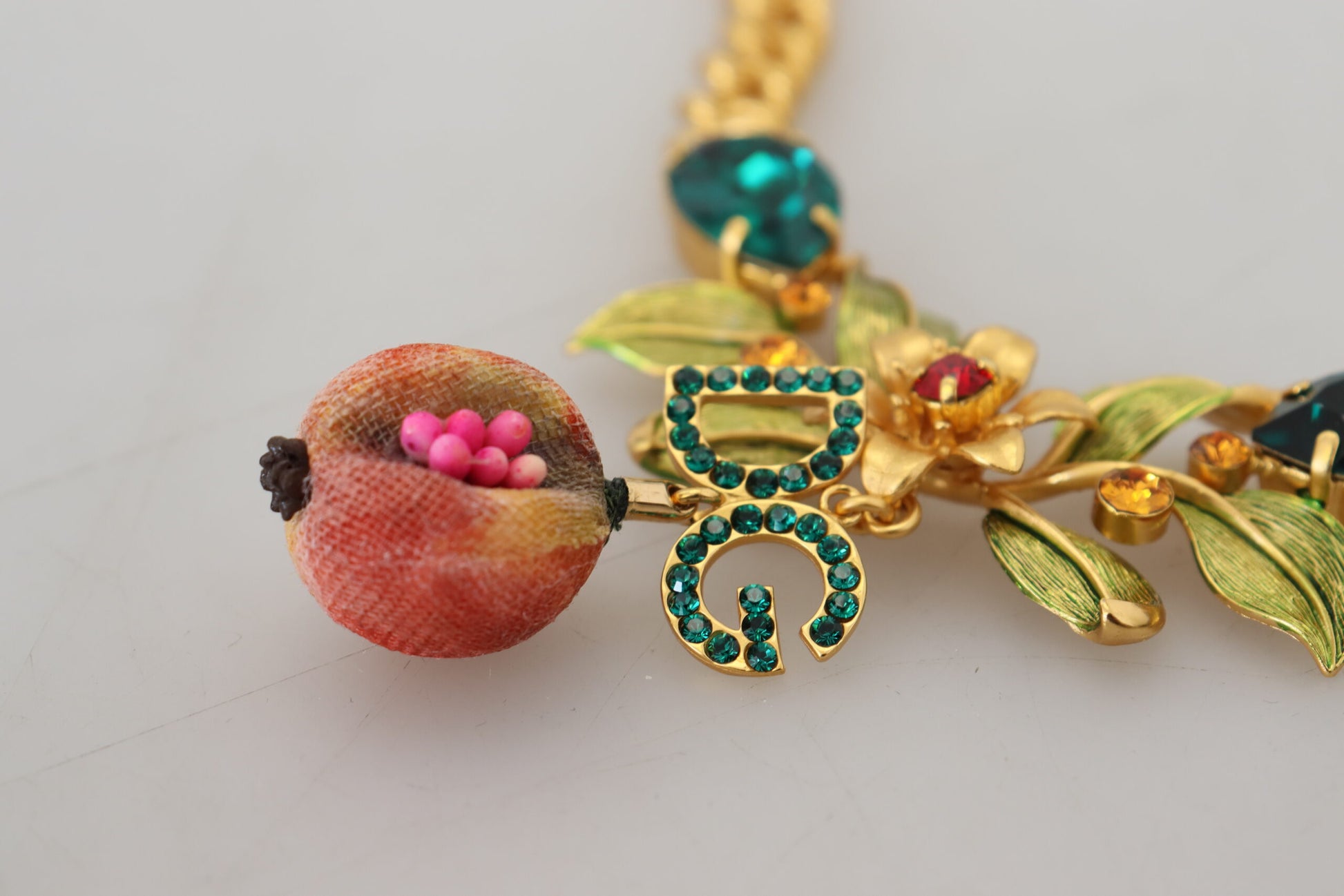 Dolce &amp; Gabbana Elegante goldfarbene Halskette mit Blumen und Früchten