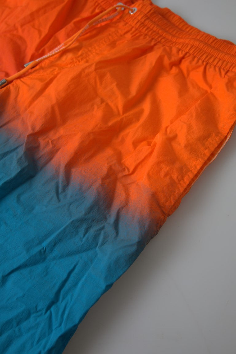 Dolce &amp; Gabbana – Badeshorts mit Farbverlaufseffekt in leuchtendem Orange