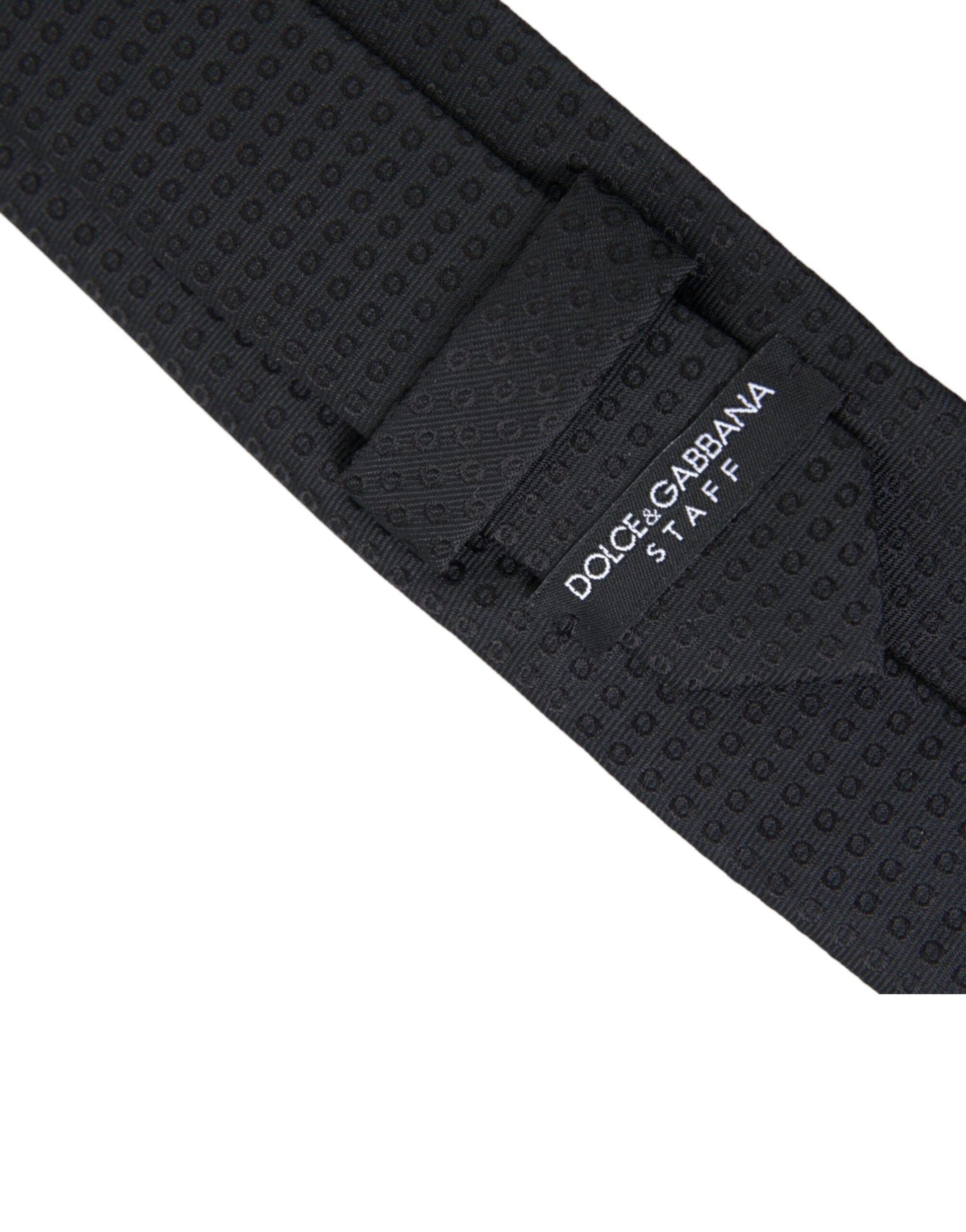 Dolce &amp; Gabbana – Verstellbare Herrenkrawatte aus Baumwolle mit Muster „STAFF“ in Schwarz