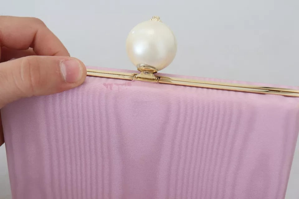 Dolce &amp; Gabbana Clutch aus rosa Seide mit Goldrahmen, Abendtasche