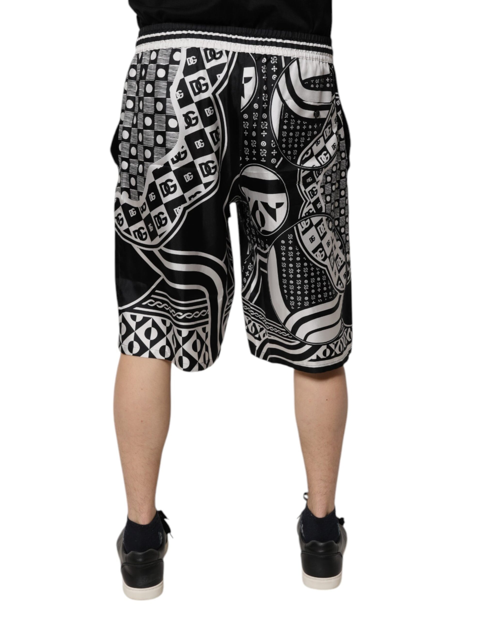 Dolce &amp; Gabbana Schwarz-Weiße Bandana-Bermudashorts aus Seide für Herren