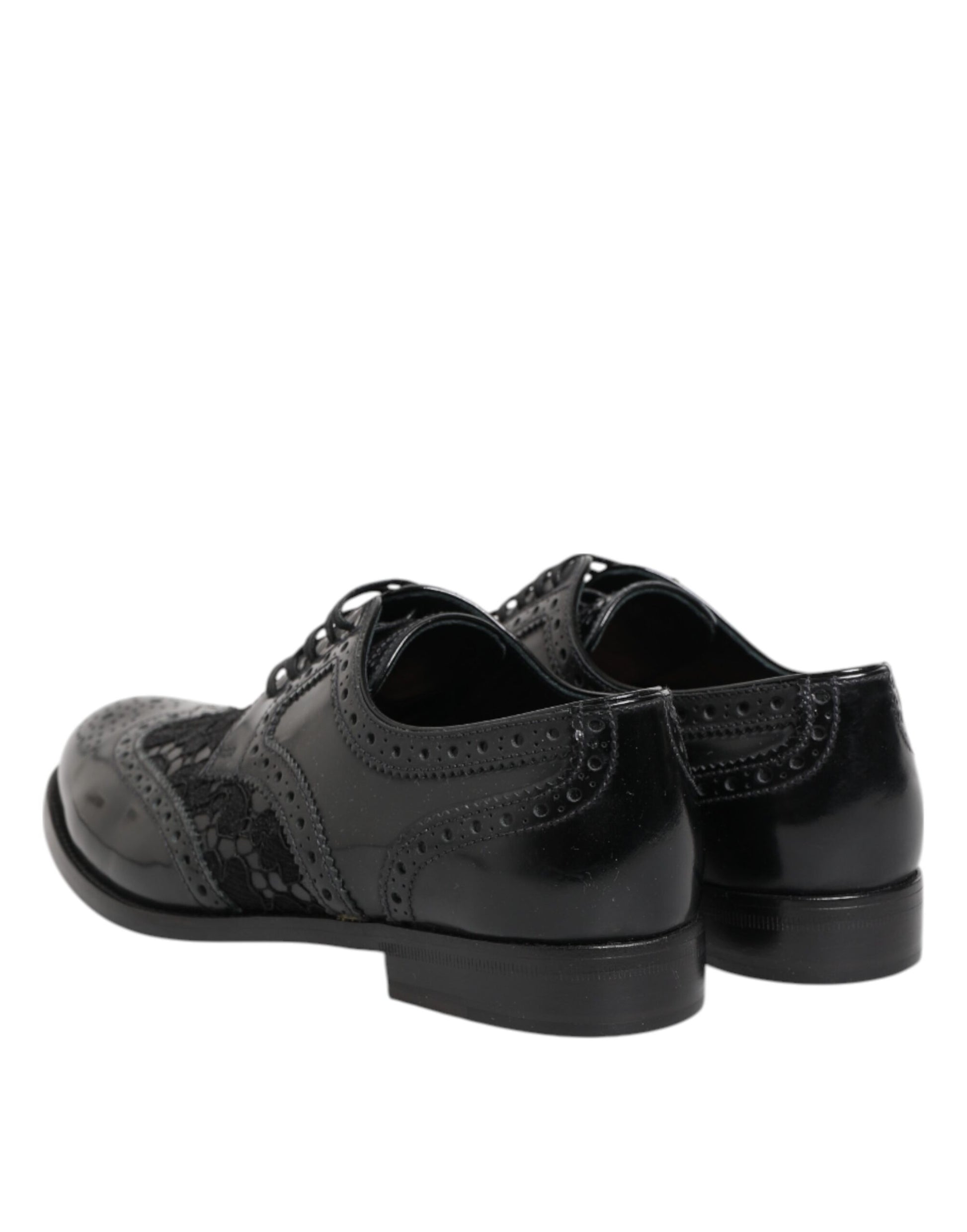 Dolce &amp; Gabbana – Formelle Schuhe aus schwarzem Leder mit floraler Spitze