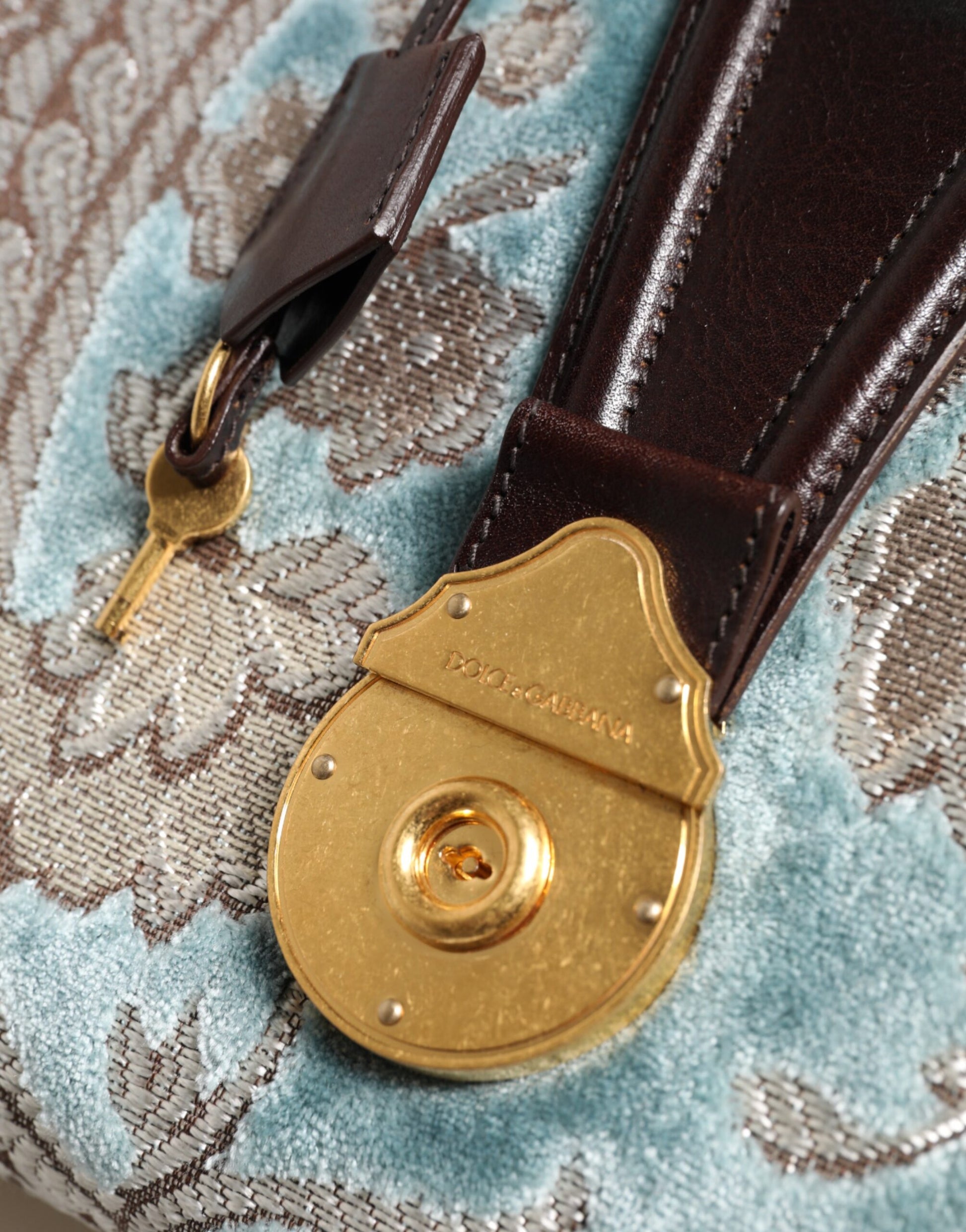 Dolce &amp; Gabbana Blau-braune Reisehandtasche aus Leder mit Blumenmuster und Jacquard